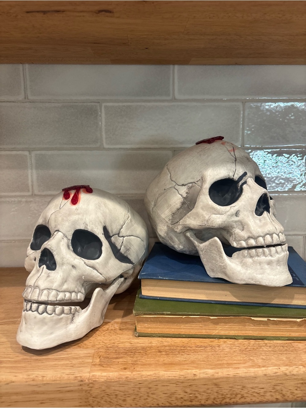 Pair of Decorative White Plastic Skull Set with Red Accents Halloween Skeleton